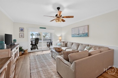 Turn-key coastal living just steps from the sand! This fully - photo 4