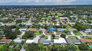 Nestled in the heart of the highly sought-after Village of - photo 7