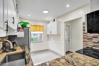 Updated First Floor 2/2 Corner Unit with Water/Preserve Views! - photo 8