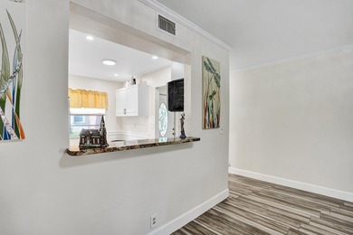 Updated First Floor 2/2 Corner Unit with Water/Preserve Views! - photo 10