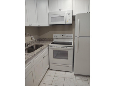 Clean and Neat 1 bedroom, 1 bath unit in 55+ Community in - photo 2