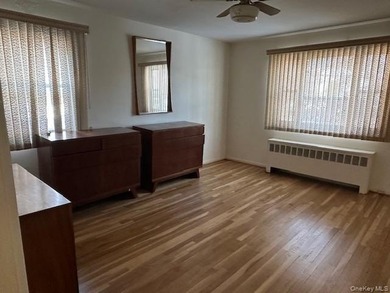 Two bedroom deluxe, oak floors, close to all, lower unit. Base - photo 11