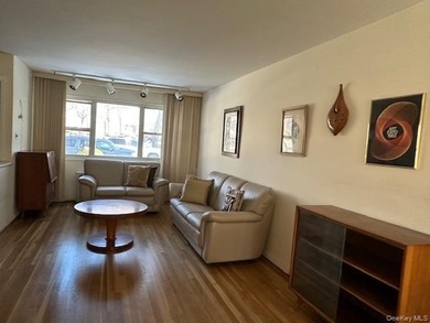 Two bedroom deluxe, oak floors, close to all, lower unit. Base - photo 12