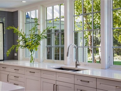 Step inside this timeless 6,000+ SF home where classic New - photo 15