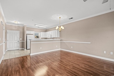 Welcome to this charming 2-bedroom, 2-bathroom first-floor condo