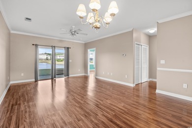 Welcome to this charming 2-bedroom, 2-bathroom first-floor condo