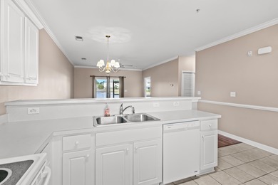 Welcome to this charming 2-bedroom, 2-bathroom first-floor condo