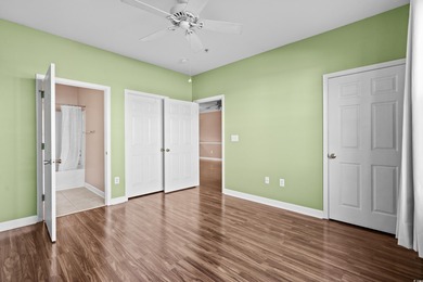 Welcome to this charming 2-bedroom, 2-bathroom first-floor condo