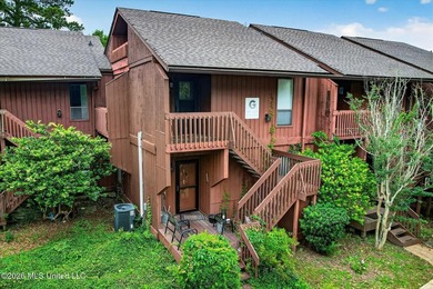 Tucked away in Lakeside Villa Condominiums, this charming - photo 2