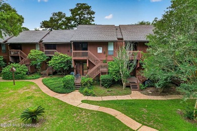 Tucked away in Lakeside Villa Condominiums, this charming - photo 5