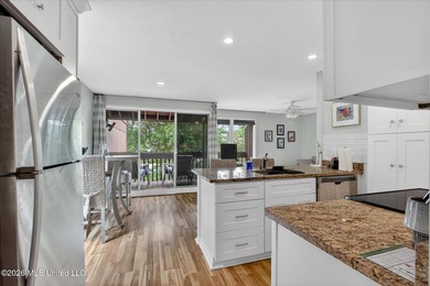 Tucked away in Lakeside Villa Condominiums, this charming - photo 7