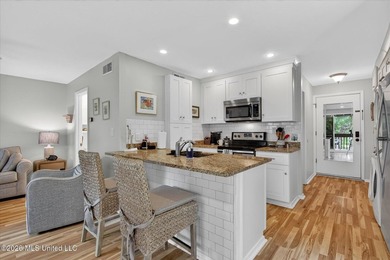 Tucked away in Lakeside Villa Condominiums, this charming - photo 8