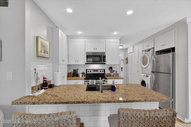 Tucked away in Lakeside Villa Condominiums, this charming - photo 9