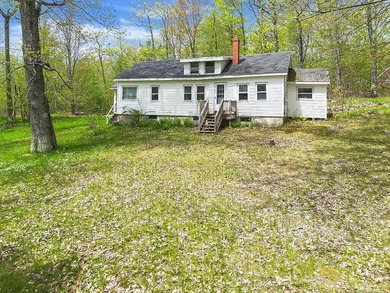 Here's an opportunity to build equity and enjoy Togus Pond. This - photo 8