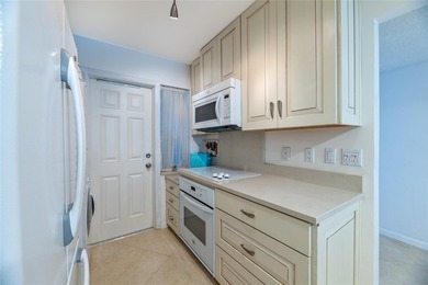 Spacious three bedroom, two bath corner unit located on the - photo 10