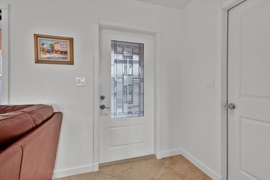 Beautifully maintained 3 BR, 2.5 BA waterfront home with 94' of - photo 8