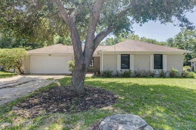 Welcome to 10 Dogwood Dr in Gulfport, MS--a beautifully updated - photo 1