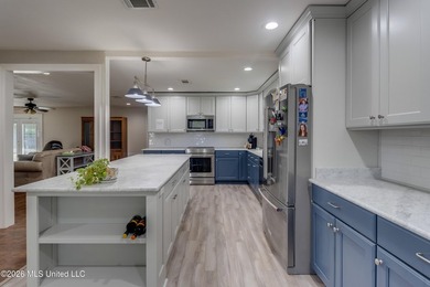 Welcome to 10 Dogwood Dr in Gulfport, MS--a beautifully updated - photo 4