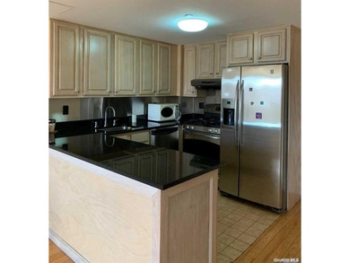 In the heart of downtown flushing, this condominium is in the - photo 3