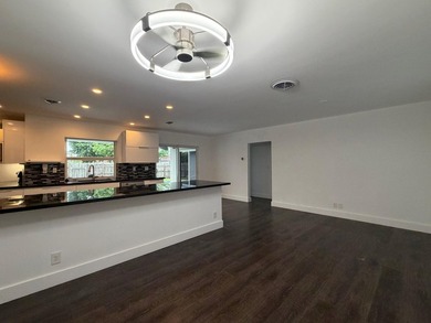 **Move-in ready and new roof (2025)** Beautifully renovated - photo 2