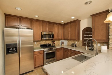 Move-in ready, this detached single-family residence is nestled - photo 7