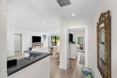 Beautifully updated 2-bedroom, 2-bath second-floor residence in - photo 7