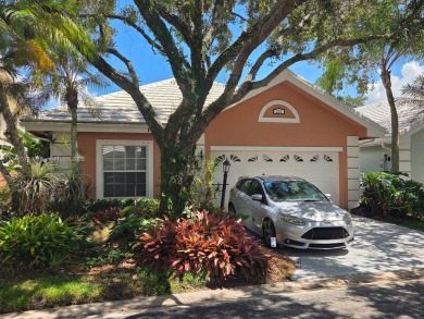 Lake Home For Sale in Palm Beach Gardens, Florida