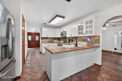 The expansive 2,574 sq. ft. interior features a formal living - photo 13