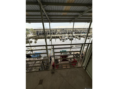 Beautiful waterfront living. This 2-bedroom, 1 full bath + half - photo 16
