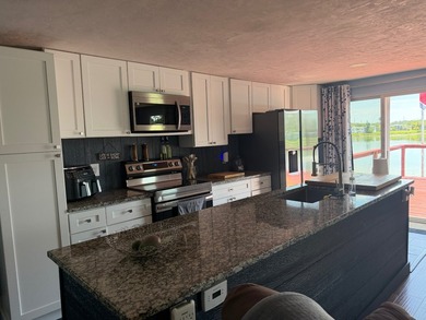 Sweet home on the lake directly next to the clubhouse with a - photo 13