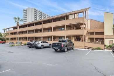 Located along the famous Golden Mile, this beautifully updated