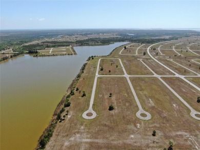 Beautiful waterfront lot located in the growing community of - photo 8