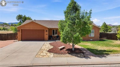 Charming & Thoughtfully Designed Home in Canon City! Welcome to - photo 1