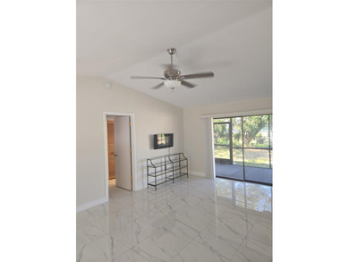 Beautiful 3 Bed 2 Bath with a screen-enclosed Lanai. Newly - photo 2