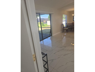 Beautiful 3 Bed 2 Bath with a screen-enclosed Lanai. Newly - photo 4