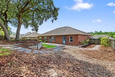 Before you reach the front door at 335 Grove Park Drive, the - photo 18
