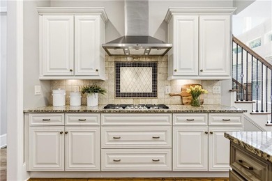 FOUR car garage! Primary suite options on both the main and - photo 23