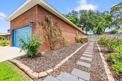 Before you reach the front door at 335 Grove Park Drive, the - photo 24