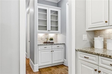 FOUR car garage! Primary suite options on both the main and - photo 24