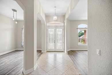 Before you reach the front door at 335 Grove Park Drive, the - photo 27