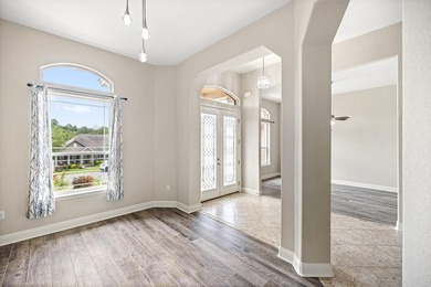 Before you reach the front door at 335 Grove Park Drive, the - photo 28