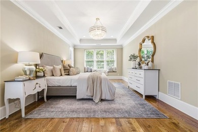 FOUR car garage! Primary suite options on both the main and - photo 32