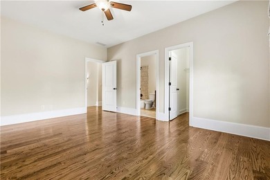 FOUR car garage! Primary suite options on both the main and - photo 34