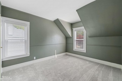 Nestled on one of Grosse Pointe's most coveted streets, this - photo 34
