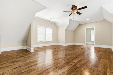 FOUR car garage! Primary suite options on both the main and - photo 35