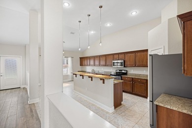 Before you reach the front door at 335 Grove Park Drive, the - photo 37