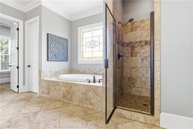 FOUR car garage! Primary suite options on both the main and - photo 40