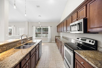 Before you reach the front door at 335 Grove Park Drive, the - photo 44