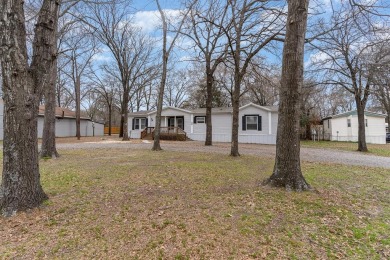 Fall in love with this charming and comfortable three-bedroom - Lake Home Sale Pending in Bonham, Texas