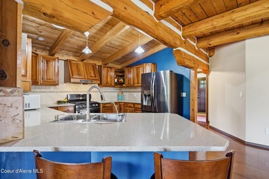 Escape to this mountain sanctuary located in Sagle, Idaho. This - photo 17